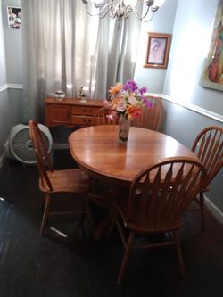 Table  five chairs.  Cabinet.   Good cond wod.  250.
