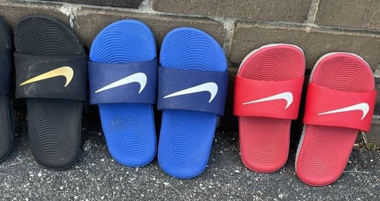 Nike Slides - Kids size's various colors Blue, Red, Volt, & Black available.