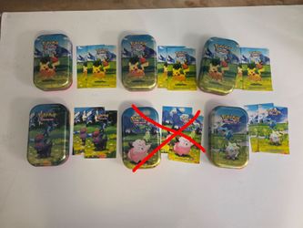 Ascended heroes tins (empty) includes art card and sticker