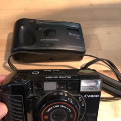2 cameras 1) Canon sure shot $65 2) Vivitar C35R $20 Or BOTH for $75 (only 37.50 Each This Way) Must Come To H.B , OC