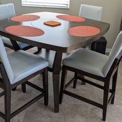 Wood top counter height Nook/Cafe table and 4 chairs.