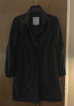 Woman’s Black Rain coat with 2 pockets/ adjustable waist/ lined/ size XS