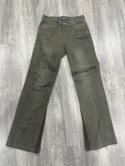 washed green flared vintage jeans