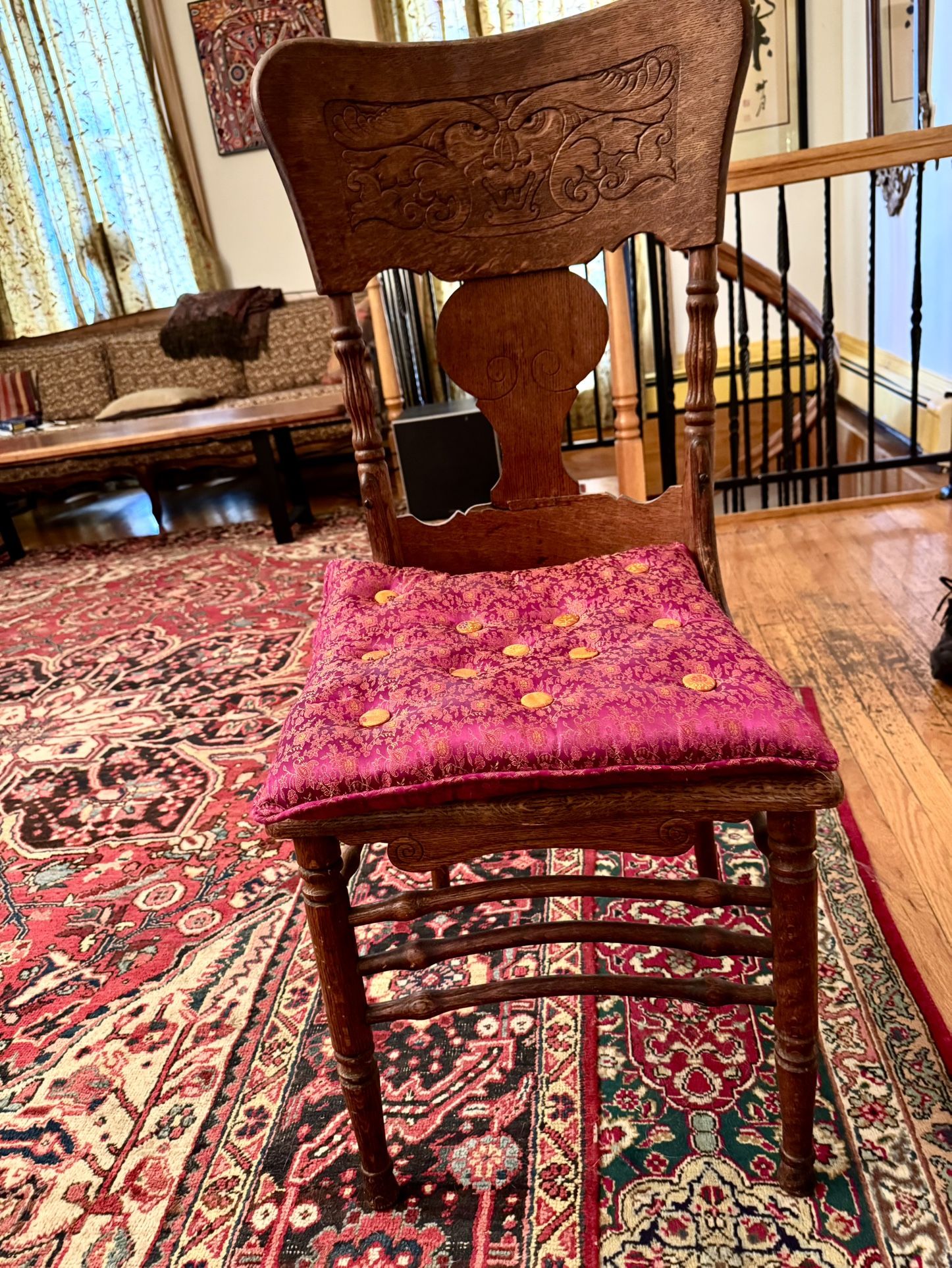 Beautiful Antique carved North Wind Chair