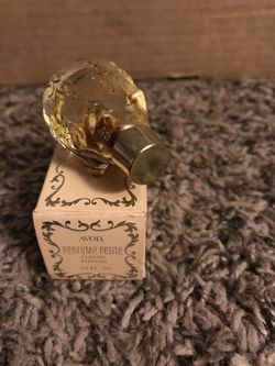 Avon petite pig bottle