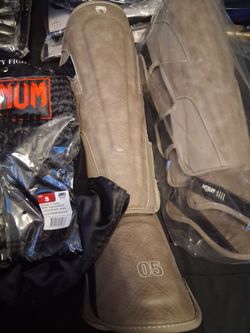 Venue gear and boxing gloves with the outfits in the knee guards
