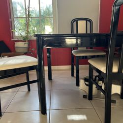 Black Lacquer Table With Gold Accents And 5 Chairs
