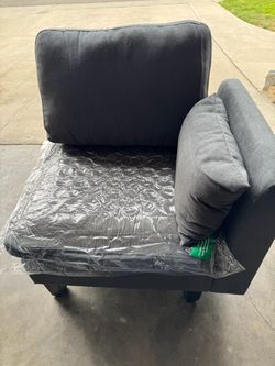 Dark Gray Upholstered Corner Chair with Ottoman