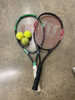 Two tennis rackets and balls