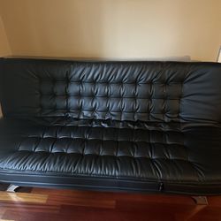 2 (Identical) Black Leather Futons. $450 Each