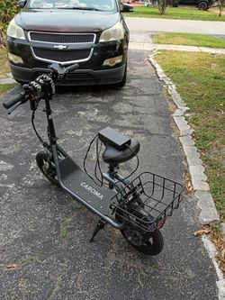 Fast Caroma Electric Motor Scooter With Seat And Long Lasting Battery
