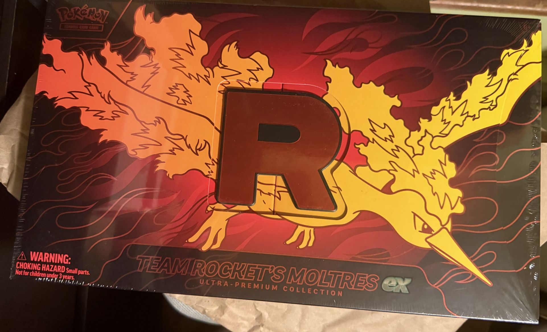 Pokemon TCG Team Rocket’s Moltres UPC Ultra Premium Collection Sealed gamestop 