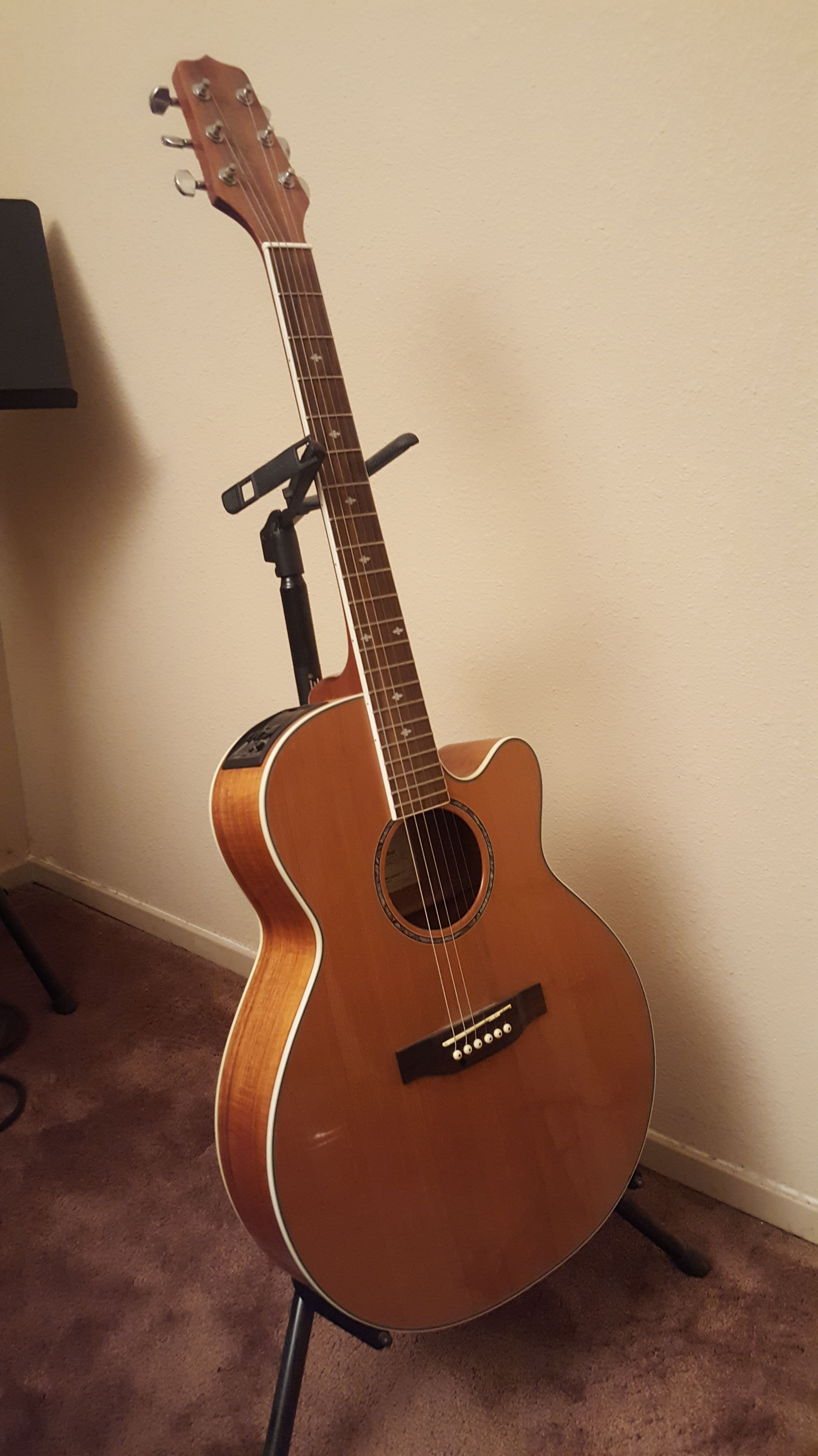 Takamine G series model #EG544SC-4C acoustic/ electric guitar. Give me your best offer.