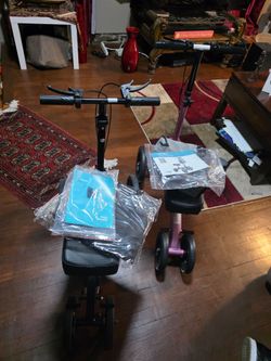 New pink or black knee scooter