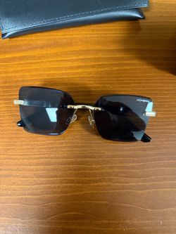 Yves Saint Laurent Rimless Sunglasses