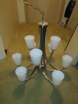 Beautiful big nickel finish chandelier. Like new. Gently used for a couple months. New it was over 600$ im asking 265$