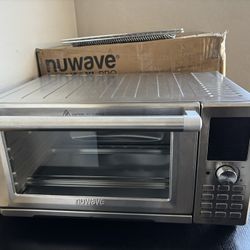 Nuwave Bravo XL Pro Air Fryer Toaster Oven, Improved 100% Super Convection  Open box item is new!  Introducing the Nuwave Bravo XL Pro Air Fryer Toast
