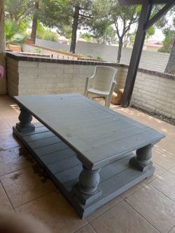 Giant outside wooden gray table