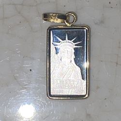 1 g credit issue platinum bar with 14 karat frame