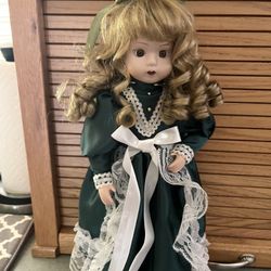 Vintage 15 Porcelain Doll In Beautiful Green Lace Trimmed Dress And Long  Curly Hair. for Sale in Beavercreek, OR - OfferUp