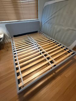 Light Gray Upholstered Bed Frame with Slats