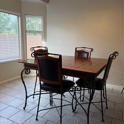 Dining table set, very sturdy and heavy. Comes with 4 chairs.