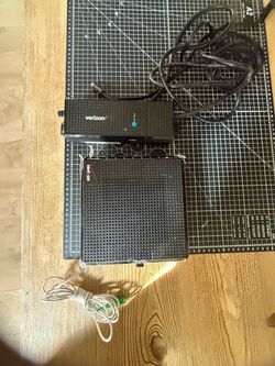 Used Verizon FiOS ARRIS ONT1000GI4 Optical Network Terminal with Delta power supply.