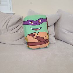plush toy of Donatello from the Teenage Mutant Ninja Turtles franchise