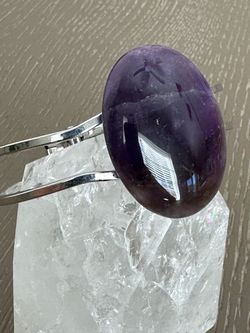 New, beautiful Amethyst Crystal platinum plated bangle bracelet.