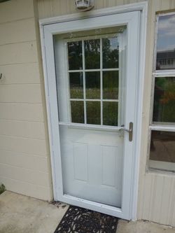 Anderson White Storm Door, (2) 36 x 80, retractable screen and lever handle