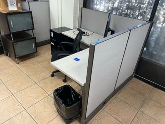 Cubicle with desk