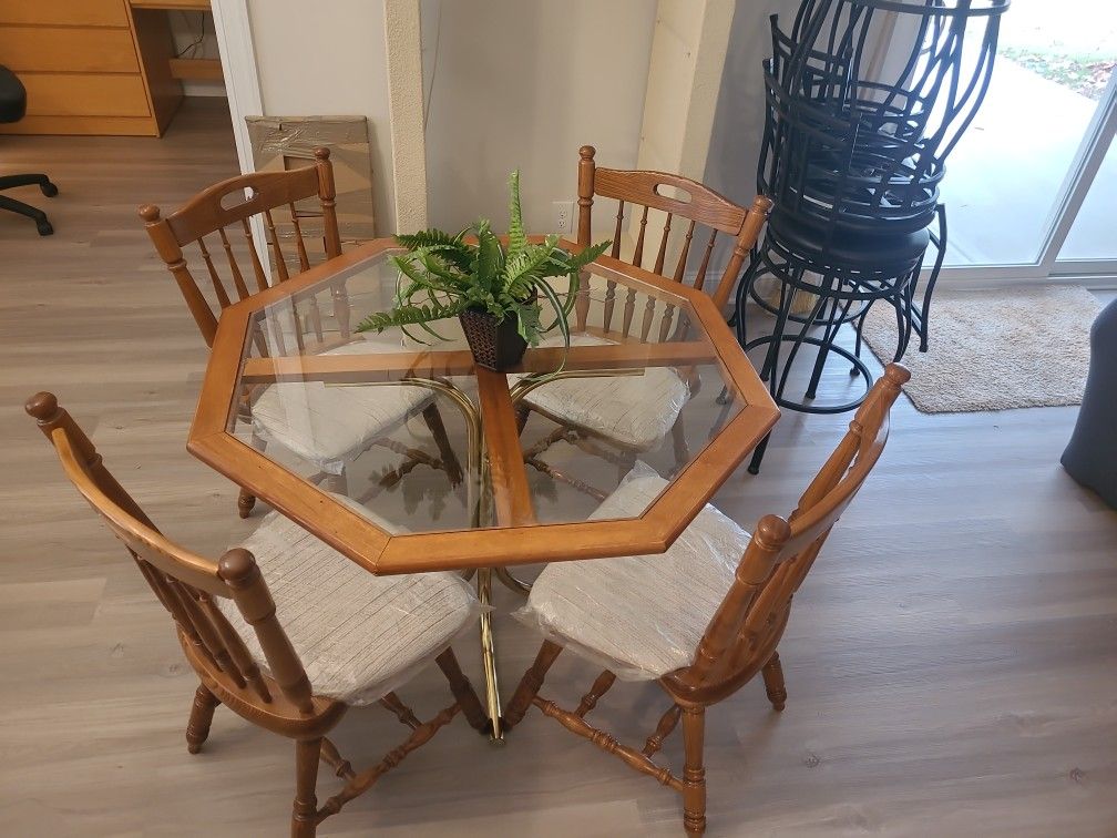 $100.00 OR  Best Offer On 4 hardwood chairs with glass table top