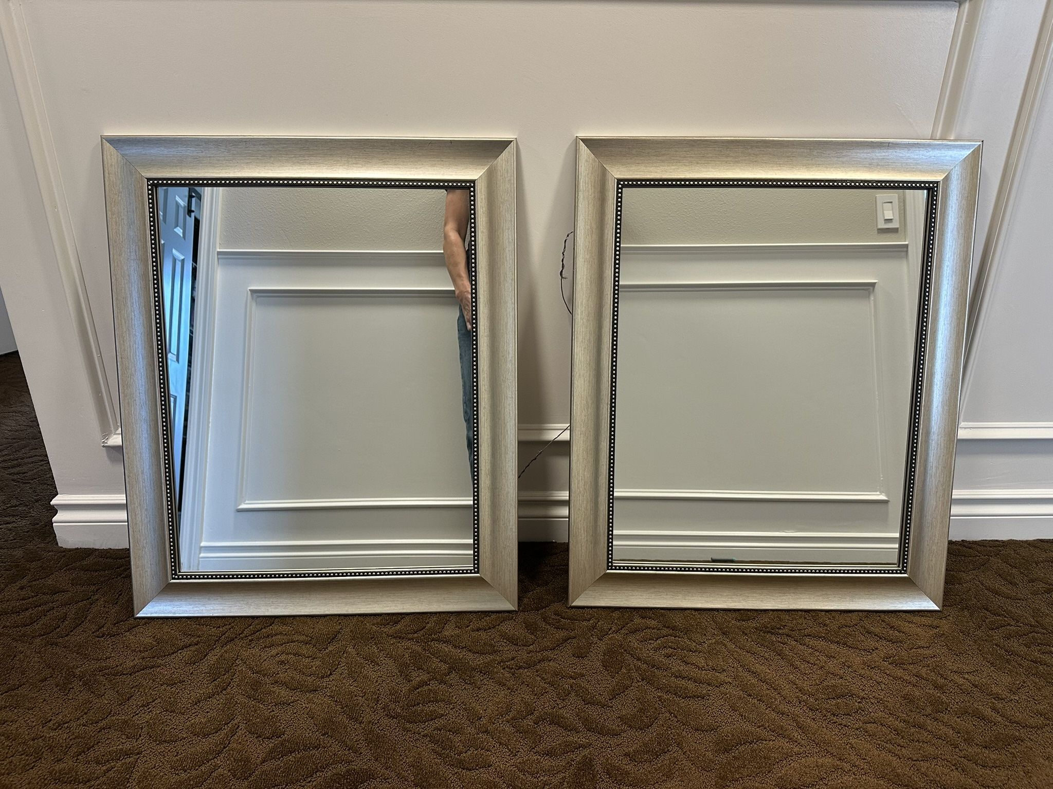 Two Silver Mirrors