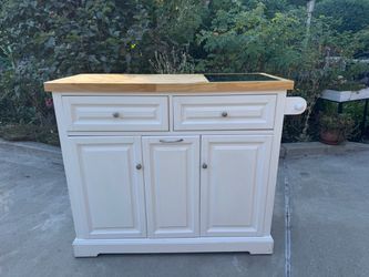 Kitchen cart on wheels with Marbke top insett Cutting Board