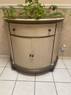 Selling a beautiful hallway/entryway table, was painted “leaves imprints still visible on left door”
