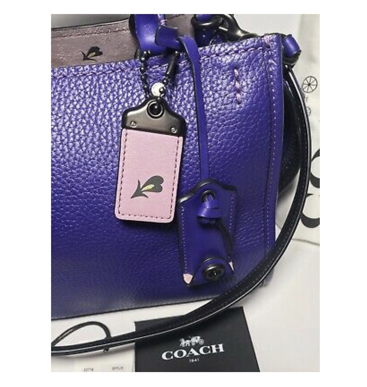 Coach dark store fairytale rogue