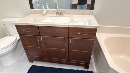 Master Bathroom 49” Wide Vanity Dark Wood With Faucet (earliest pick-up December 10)