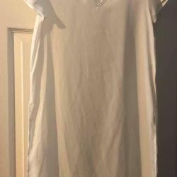 New dressy long see thru blouse size M slots on the sides