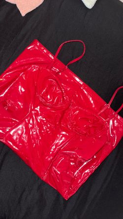 Red leather mini dress size small fits size sort of medium and fits girls on the taller side has zipper in the back