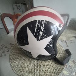 MMG (Moped & Motorbike Group) motorcycle helmet, specifically the Jet model.