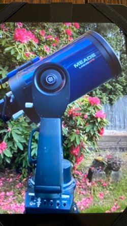 10 inch Meade telescope Maksutov-Cassegrain with 8 eyepieces and tripod with hard plastic storage case.