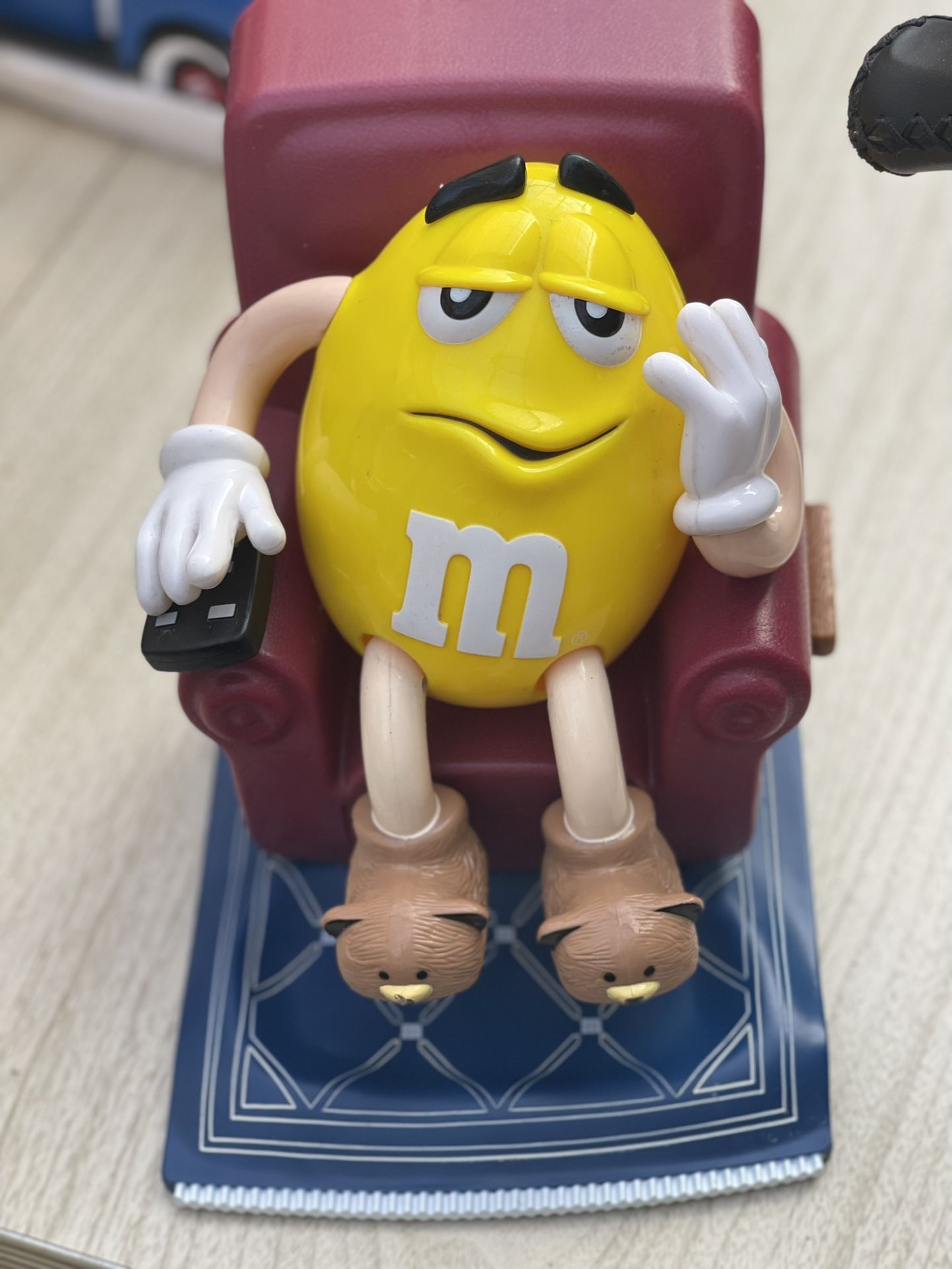 1999 M&m candy dispenser, collectible. yellow penut in his recliner