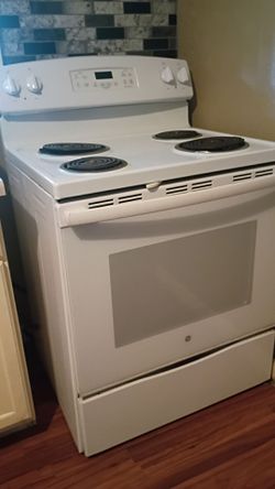 white GE freestanding electric range stove