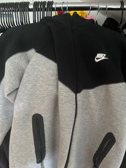 Grey and black Nike tech