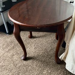 Round wooden end table