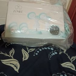 Breast Pumps  New / Nursing Pillow 