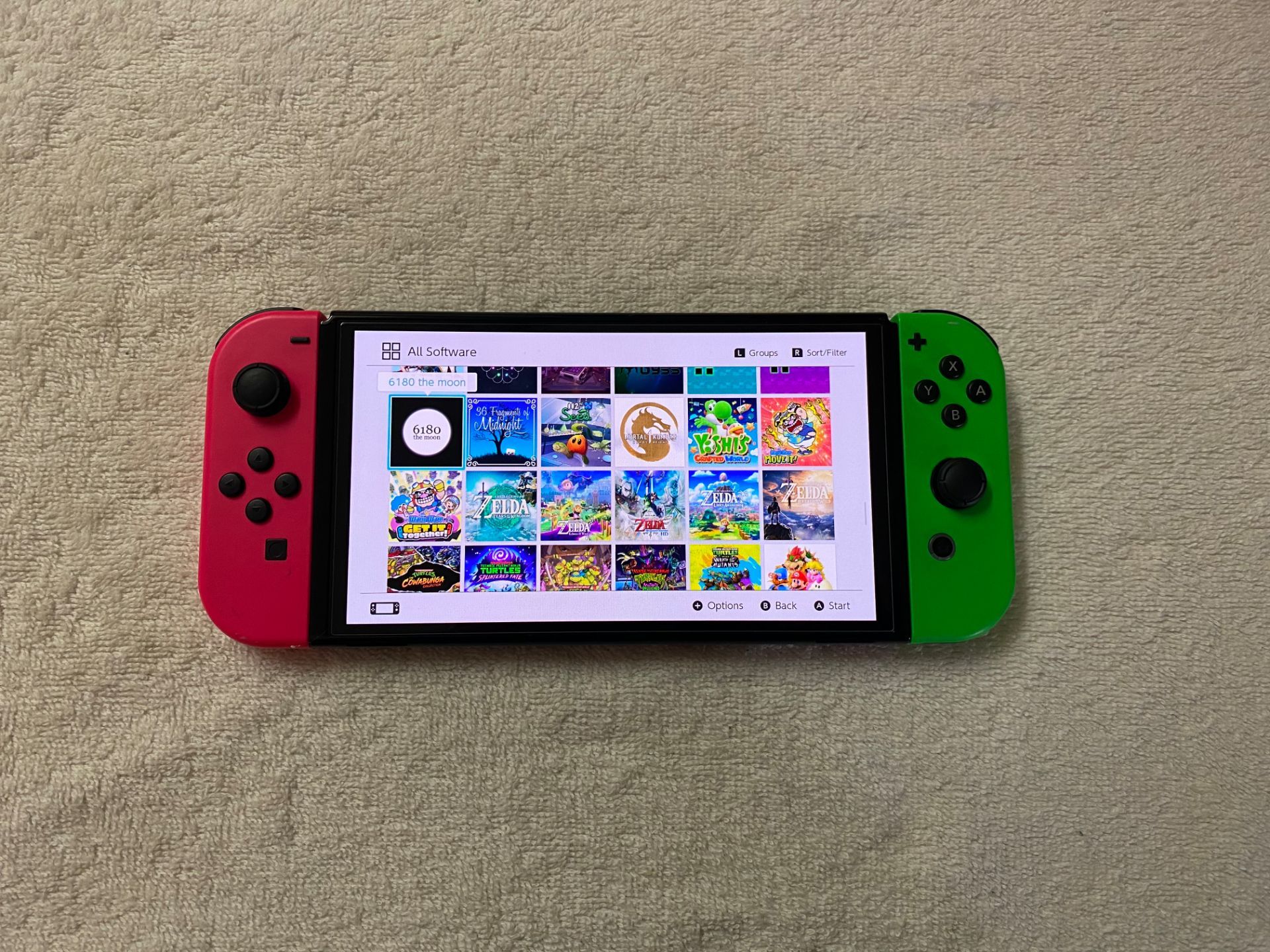 NINTENDO SWITCH OLED with 120 POPULAR SWITCH GAMES