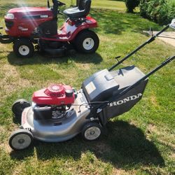 Honda twin blade mower  . with bag