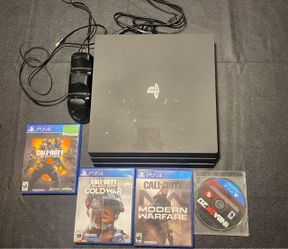 PS4 Pro Console with Games and Accessories