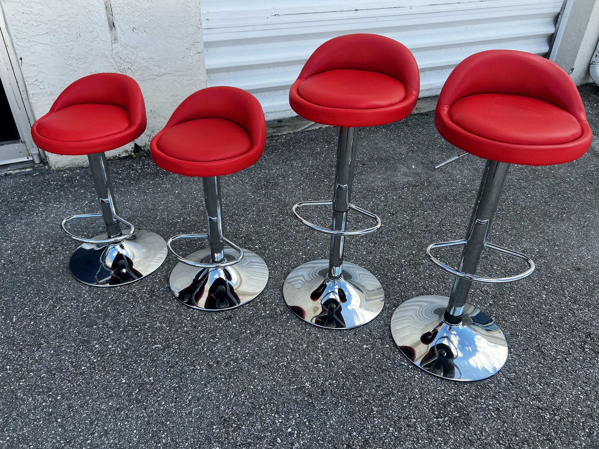 $125 for all 4! 4 Modern Red Chrome Based Swivel Adjustable Height Bar Stools! Seat height adjusts 23-31in 